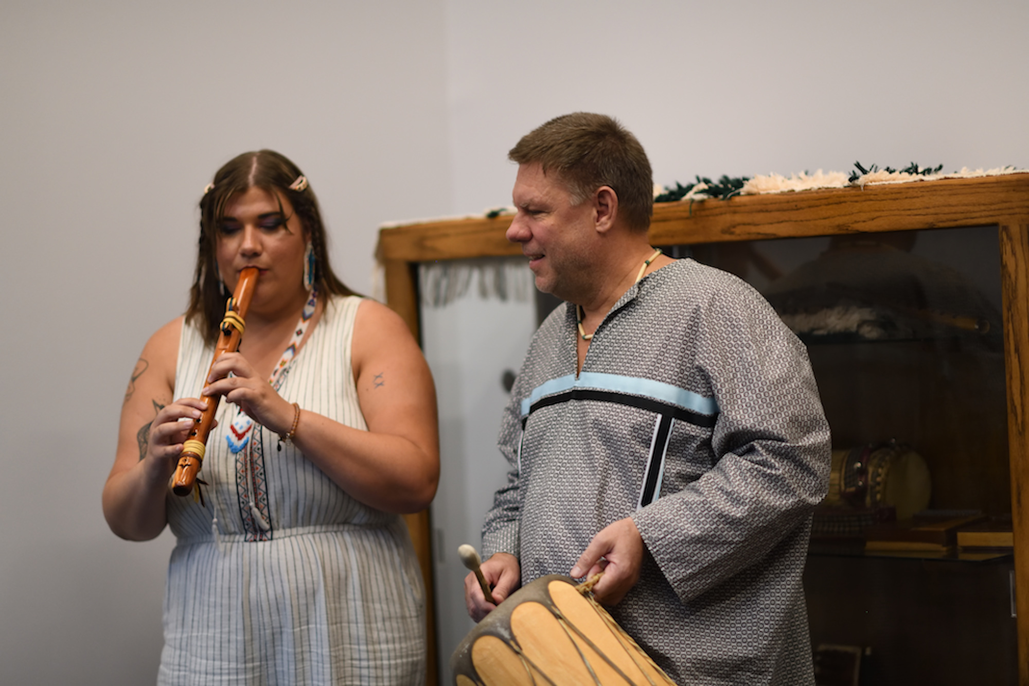 Student Courtney Cater and Professor Robert Damm, Ph.D., play instruments donated in the Kaufman Collection.