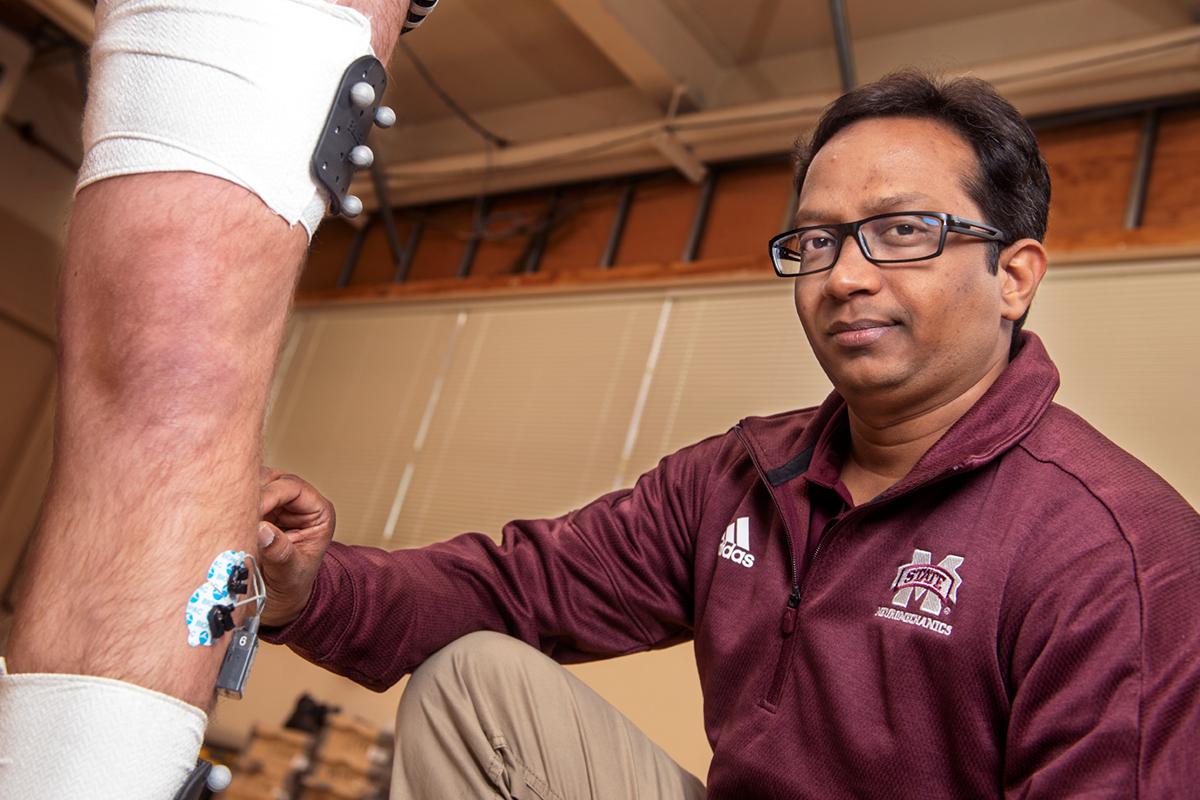 Photo of Harish Chander in his lab.