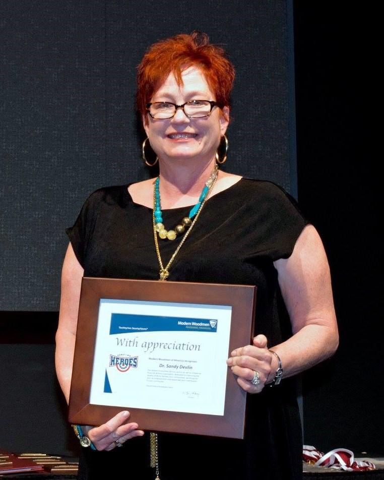 Devlin Honored with 2016 Modern Woodmen Hometown Hero Award