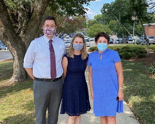 Dan Gadke and Kasee Stratton-Gadke are pictured with Lynn Hosemann.
