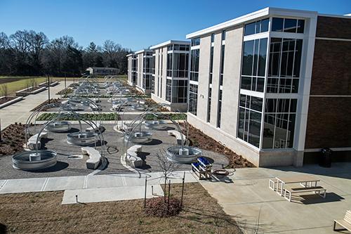 Learning garden spaces are prepared at the Partnership Middle School.