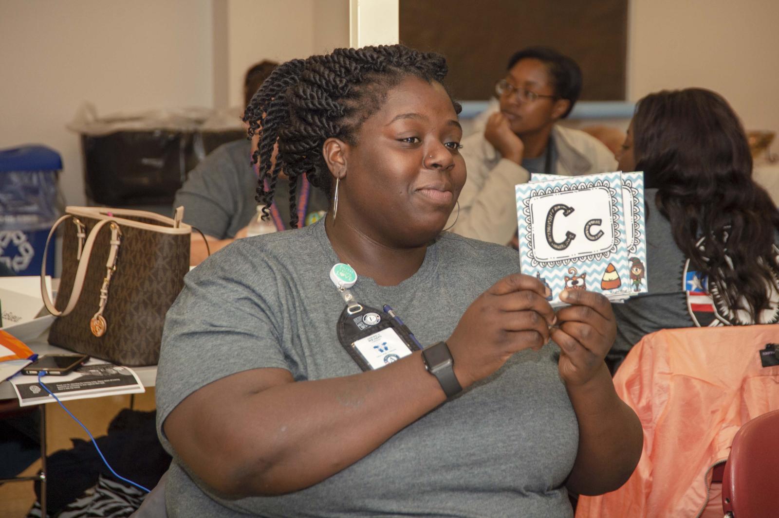 America Reads student practices tutoring.