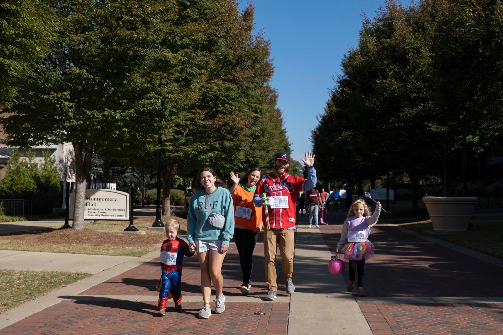 Participants in T.K. Martin's fun run walk on campus