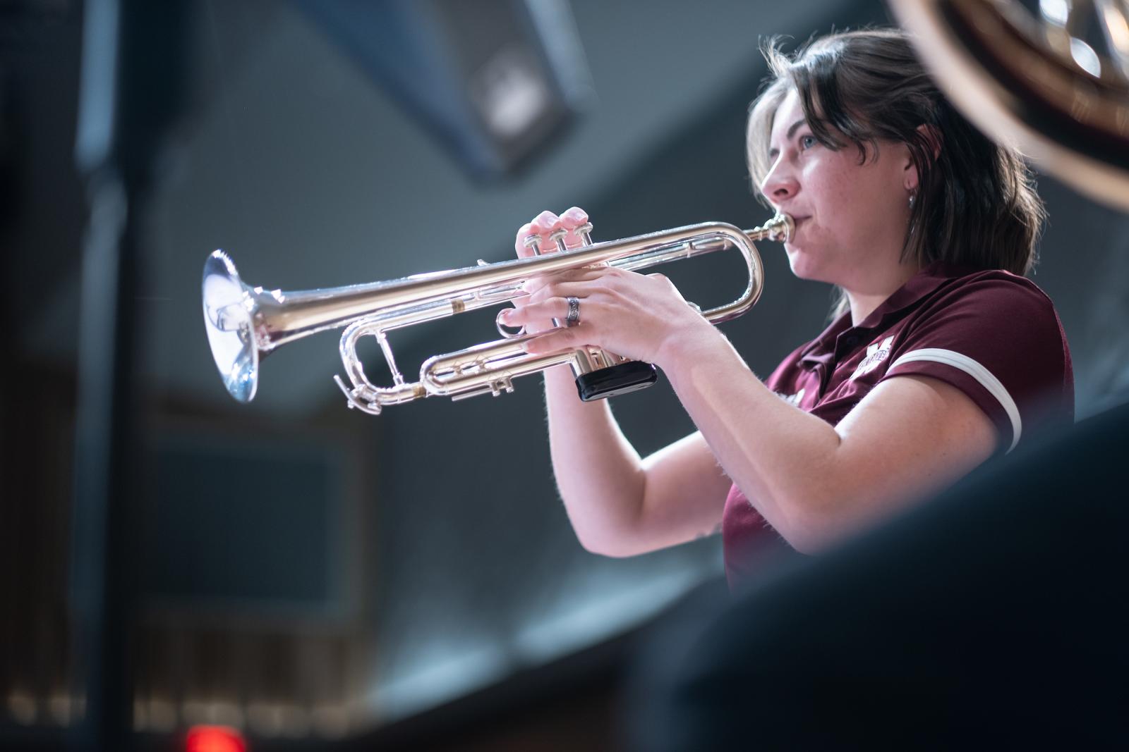 Student playing a trumpet