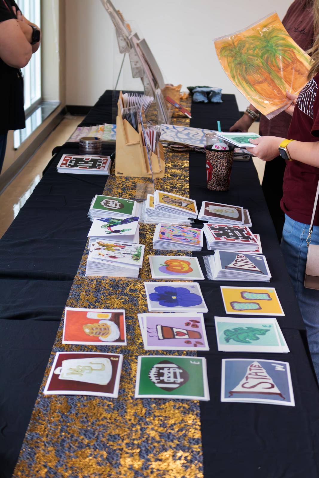 Colorful postcards for sale on a table