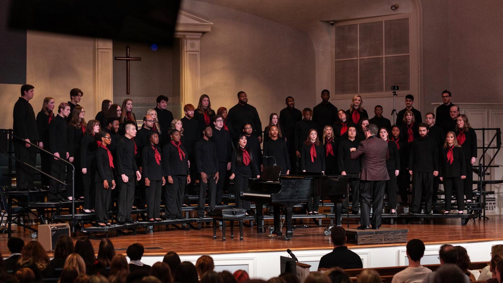 Choral students perform in church sanctuary