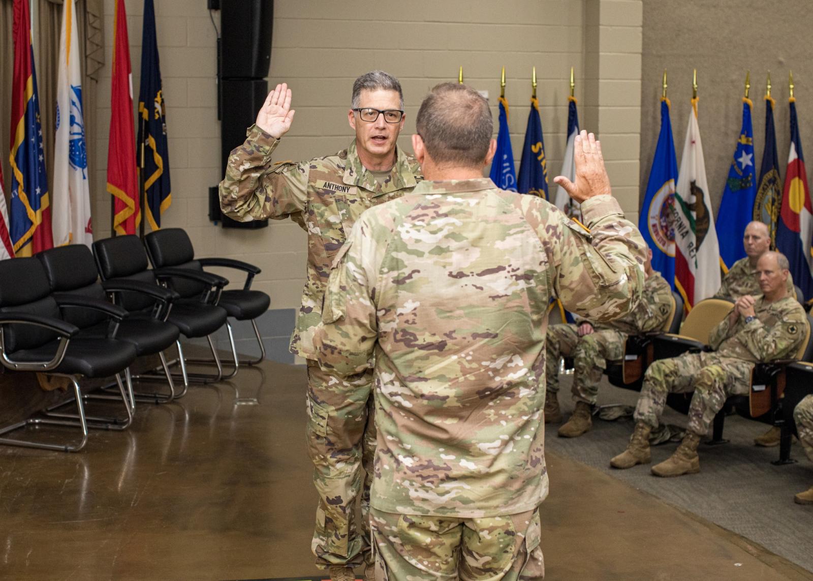 Kenneth Anthony is promoted to the rank of colonel during a formal ceremony.