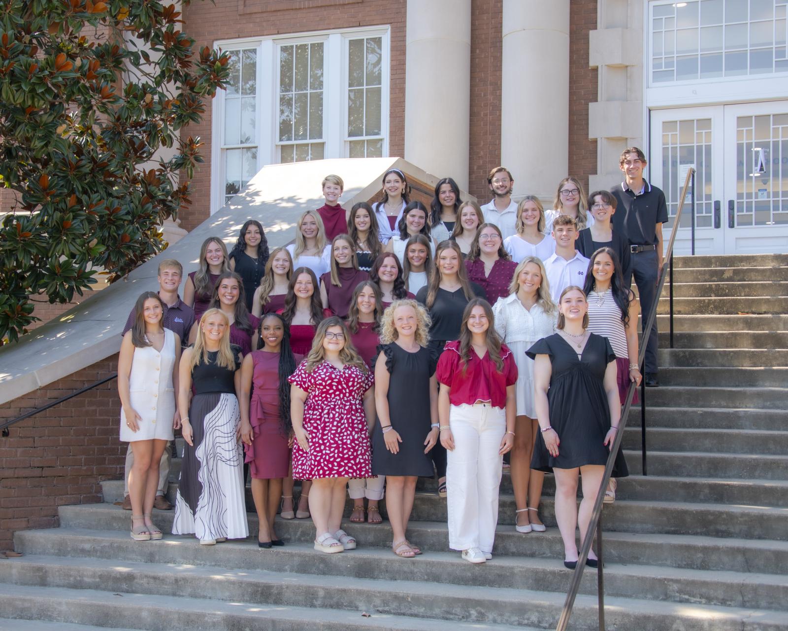 Group of METP Scholars posed for photo on steps