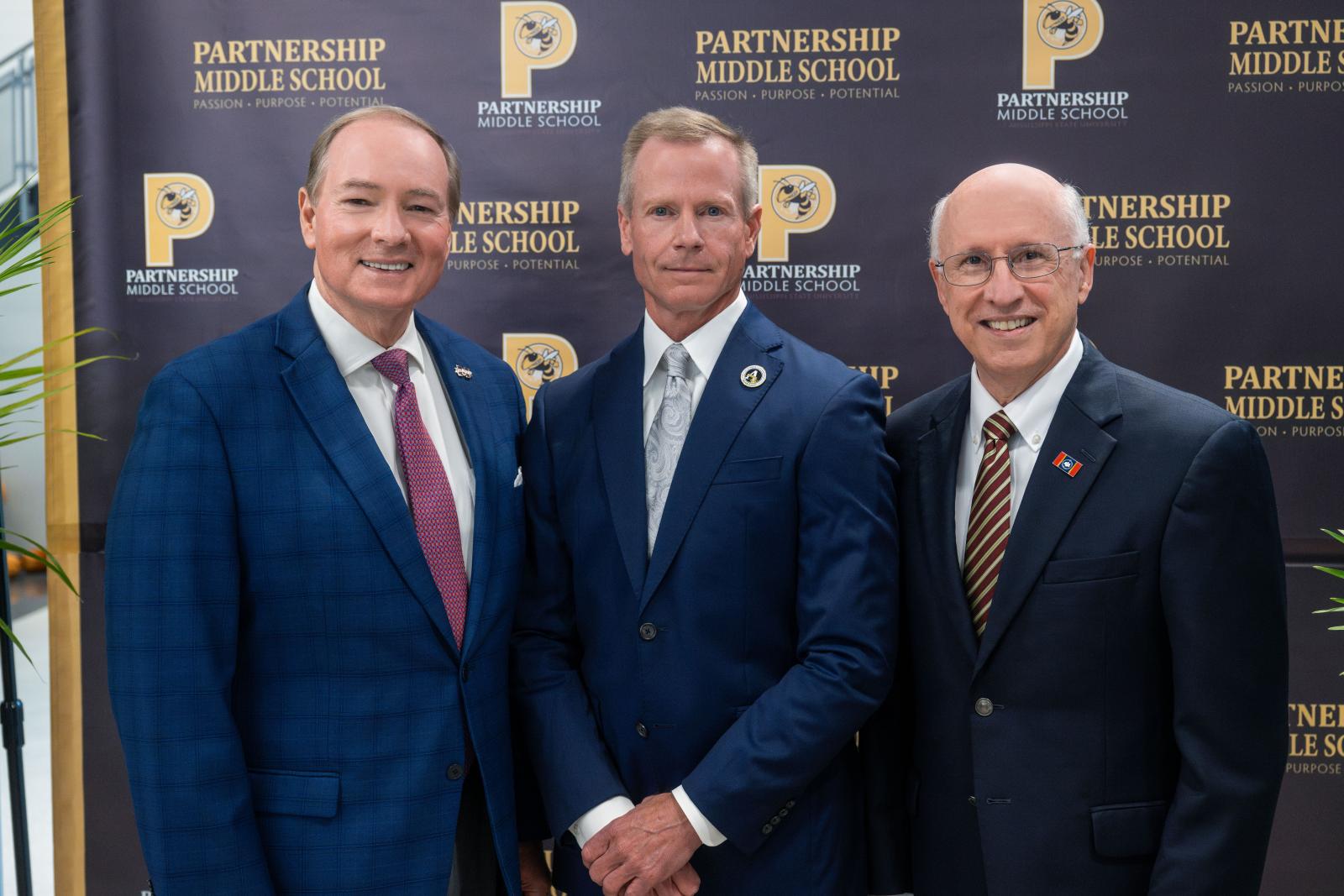 From left are MSU President Mark E. Keenum, SOCSD Superintendent Tony McGee and MSU Provost and Executive Vice President David Shaw pose for a photo.