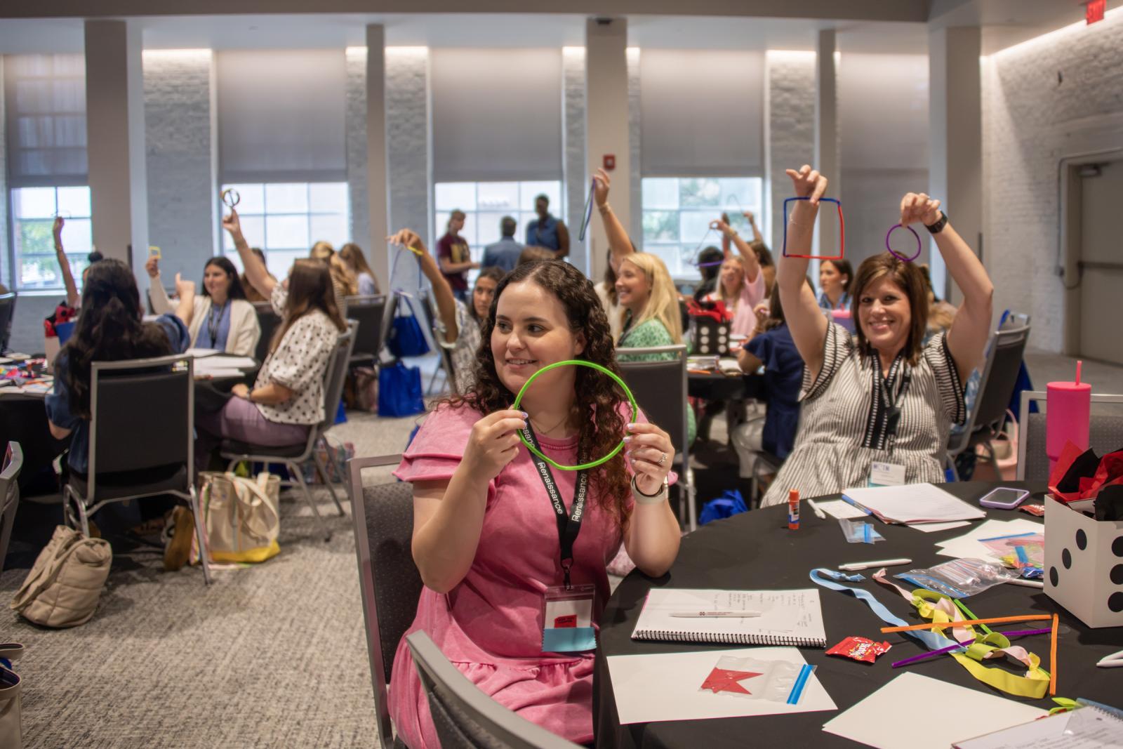 Conference participants engage in hands-on activities.